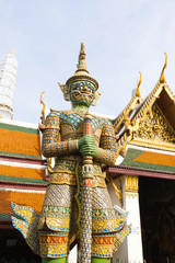 Fototapeta premium Giant statue at Temple of the Emerald Buddha (Wat pra kaew) 