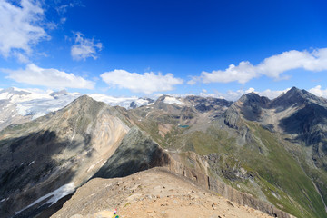 Fototapeta na wymiar Panorama with lake Eissee, mountain Weißspitze and glacier Großvenediger in the Hohe Tauern Alps, Austria