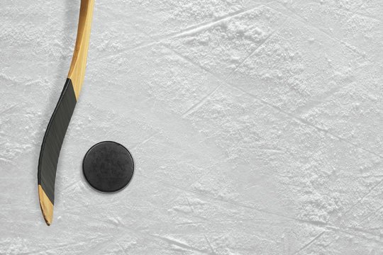 Hockey stick and puck on the ice