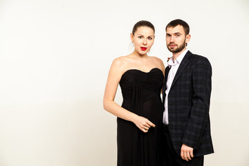 Young happy cheerful pregnant woman with husband together