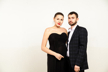 Young happy cheerful pregnant woman with husband together