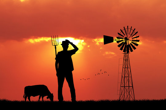 Farmer In The Farm At Sunset