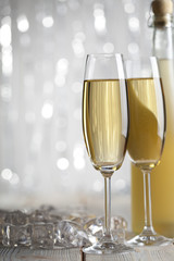 Happy new year - two glasses and bottle of champagne