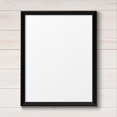Blank black picture frame on the grunge white wooden texture. ba