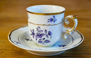 white porcelain cup with a pattern