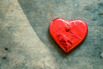 Fototapeta premium Valentines day red heart on wood background/ Valentines day red