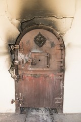 Ancient crematory red door in public temple of Thailand - Crematorium

