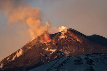 Volcano eruption. Mount Etna erupting from the crater Southeast

