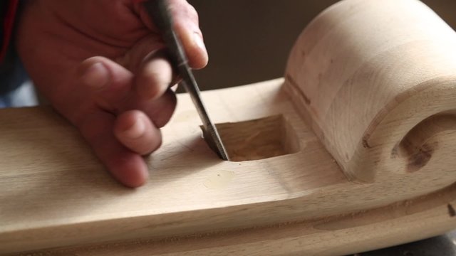 Carpenter workpieces made of wood with sandpaper