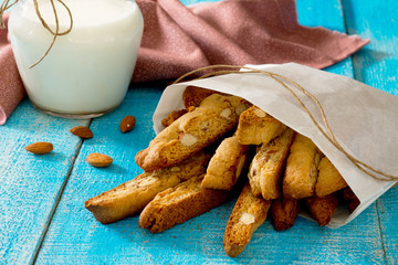Traditional Italian pastry biscuit (cantuccini) on a wooden tabl
