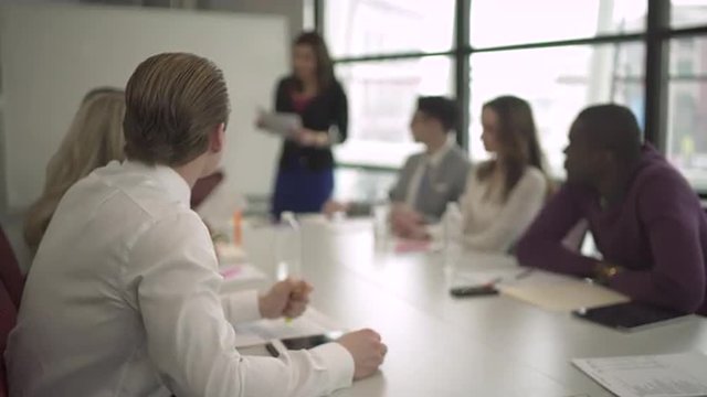 Group of attractive professionals involved in meeting