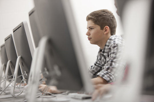 Boy using computer in the computer laboratory