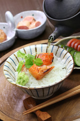 ochazuke is a simple Japanese dish made by pouring green tea over cooked rice.
