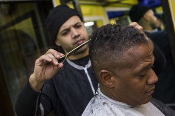 Barber Giving his Client a Haircut, In Barber Shop
