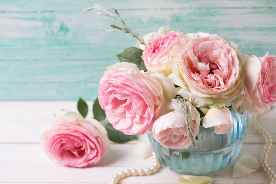 Pink roses flowers  in blue vase