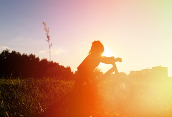 little girl riding bike at sunset, active kids