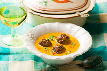 carrot quenelles cream soup.