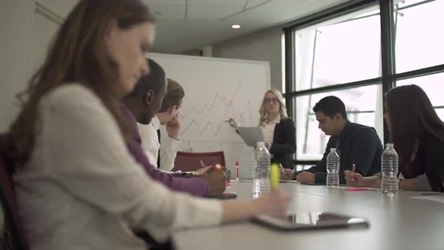 Group of attractive professionals involved in meeting