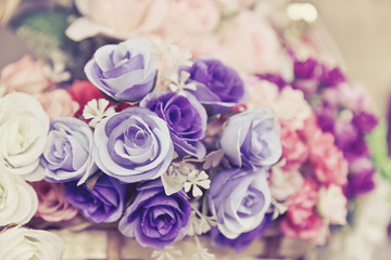 Bunch of rose flower, mainly focus on purple rose.