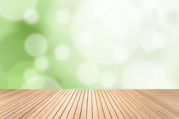 Abstract green bokeh and light cream color wooden floor texture