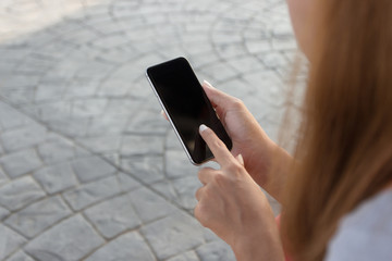 close up woman touch on phone modern lifestyle in city