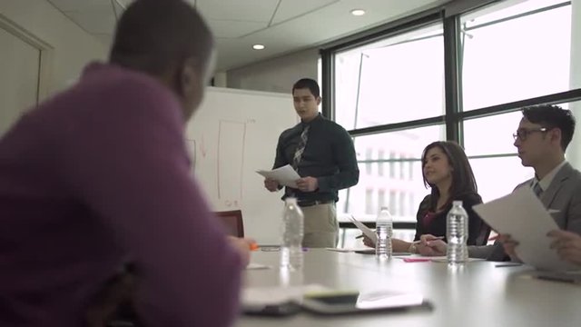 Group of attractive professionals involved in meeting