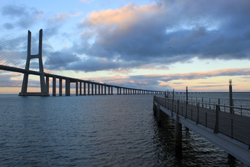 Fototapeta premium Vasco da Gama bridge crossing with another bridge