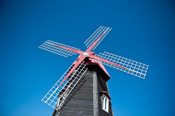 Windmill in Incheon, South Korea, with a blue sky background
