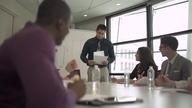 Group of attractive professionals involved in meeting