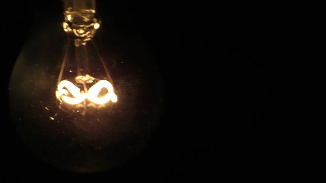 Old bulb lamp blink motion during earthquake power gravity