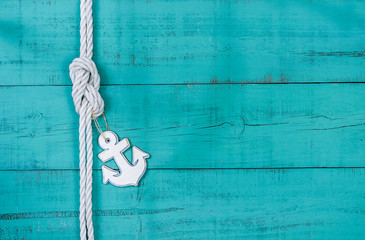 Blank rustic teal blue sign with rope and anchor border
