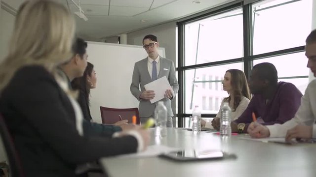Group of attractive professionals involved in meeting