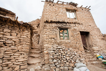 Fototapeta na wymiar Textured stone houses in traditional mountain vilage, Kurdistan