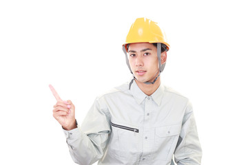 指示する笑顔の労働者