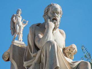 Statue of Socrates with the Apollo column in the background
