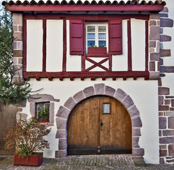 Front view of Basque traditional building in Saint-Jean-Pied-de-