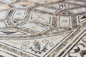Fototapeta na wymiar Roman mosaic in Italica. Ancient mosaic. Roman ruins of Italica. Santiponce. Sevilla. Spain.