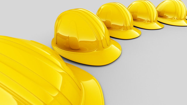 Seamless animation of the circular array of yellow safety helmets. Loopable. HD