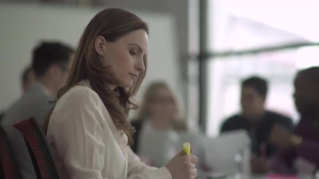 Group of attractive professionals involved in meeting