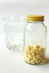Medicine and a glass of water