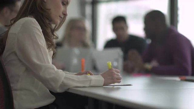 Group of attractive professionals involved in meeting