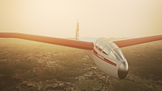 The white sailplane calmly gliding in the sky over the snow-covered mountains.