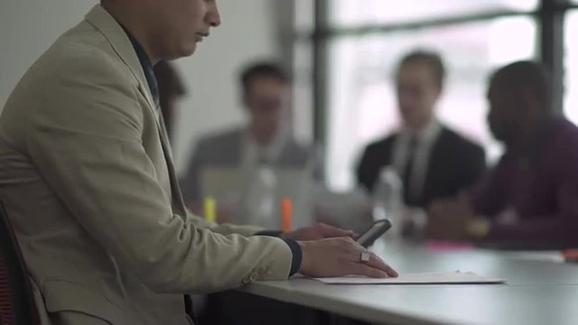 Group of attractive professionals involved in meeting