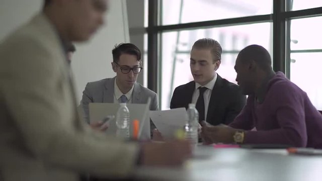 Group of attractive professionals involved in meeting