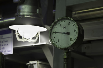 industrial manometer and led night lamp closeup