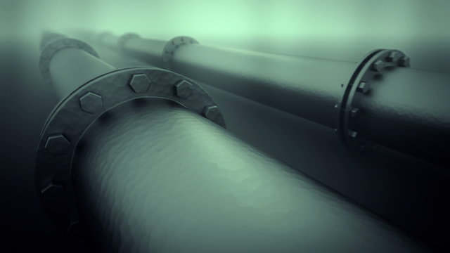 Industrial pipes with flanged joints receding into atmospheric haze