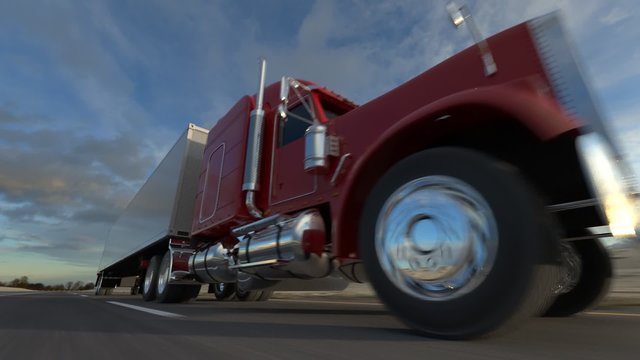 Oncoming huge semi-trailer truck riding on the highway. Closeup animation. HD