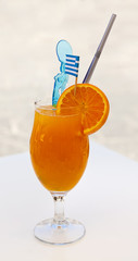 Orange juice with straw