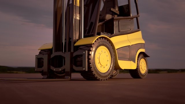Professional forklift is using hydraulic machinery to load heavy cargo.