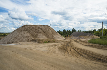 The pile of sand for the construction of roads